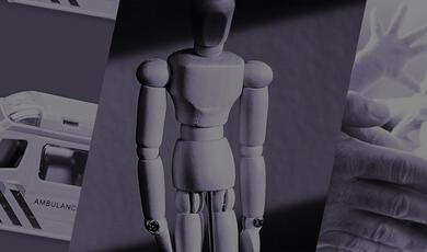 Ambulance, wooden mannequin and baby with purple overlay