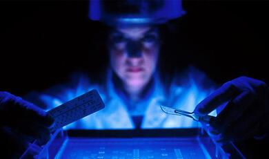 Medical scientist examining DNA