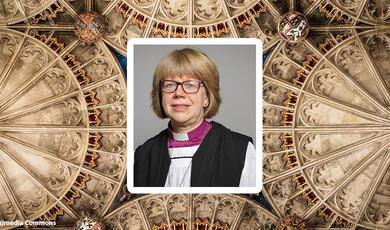 Sarah Mullally, against backdrop of Canterbury Cathedral Tower Ceiling