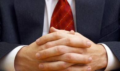 male hands together with fingers embraced