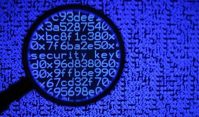 magnifying glass examines neon blue, digital code