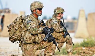 Two US soldiers in combat gear