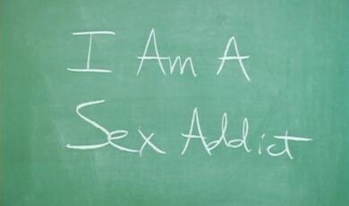 'I am a Sex addict' written on blackboard in chalk