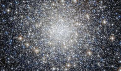 A dense, bright globular star cluster or galaxy against a dark background, filled with countless stars