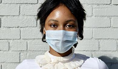 Black lady wearing mask