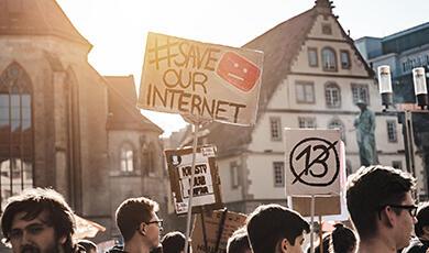 a group of protestors with placards