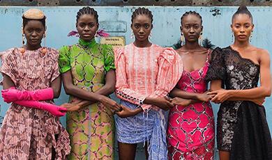 a photograph of five African women in different styles of outfits