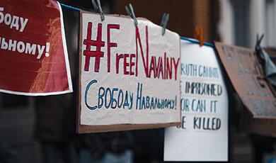 a placard reading '#FreeNavalny'