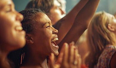 Smiling audience at gig
