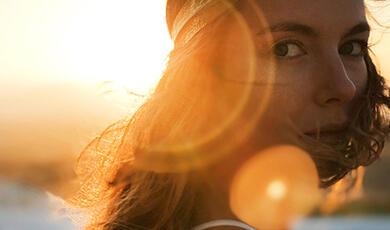 woman wearing headband turning to the right