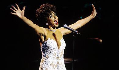 Dame Shirley Bassey singing