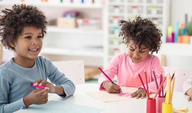 two children drawing