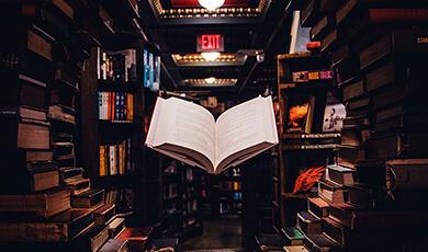 book floating in the middle of a library