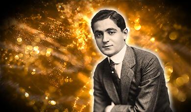 Irving Berlin on sparkly golden backdrop