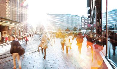 Blur of people walking in city centre