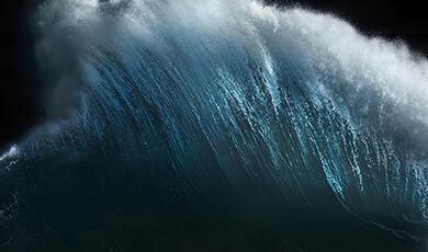 A close-up image of a wave