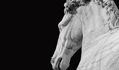 A close-up, black and white shot of the Equestrian Statue of Marcus Aurelius