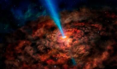 An artist's concept of a supermassive black hole at the center of a galaxy, surrounded by a swirling, orange and brown accretion disk of gas and dust. A powerful, bright blue jet of energy shoots upward from the black hole's core into the dark, star-speckled expanse of space