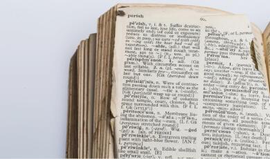 Close up of old dictionary page