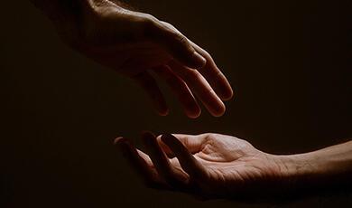 Hands touching