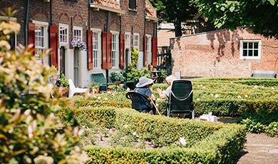 Old people sitting outside in garden