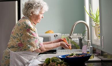 Old lady washing hands