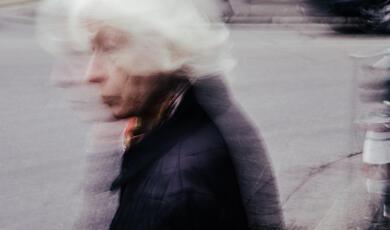 Blurred photo of an elderly woman