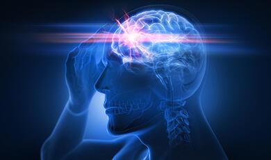 Xray like image f man holding head with front of brain highlighted