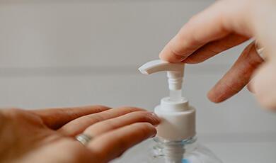 Person putting soap on hands