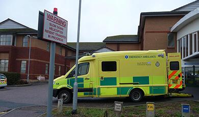 Ambulance in front of NHS hospital