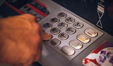 Person using ATM