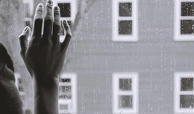 Hand on window