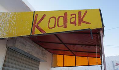 handwritten Kodak sign on shop awning, taken in North Africa