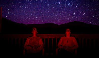 Two people stargazing