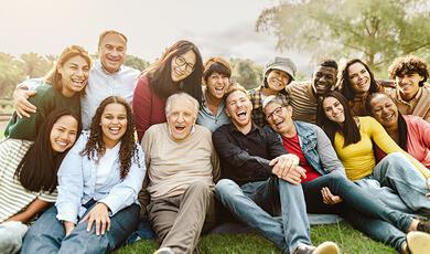 Hands holding light bulb