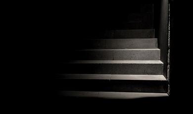 dimly-lit stairwell