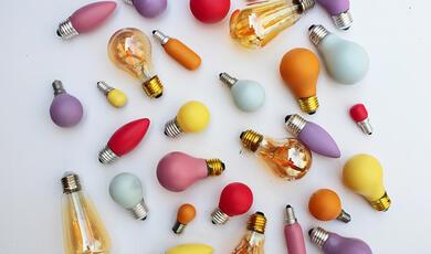 Selection of colourful light bulbs