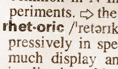 Close up of the word 'rhetoric' in dictionary