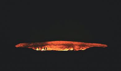 Mouth of a firey, volcanic hole at night