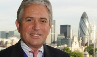 Nicholas Anstee in front of the City of London Skyline