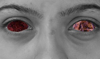 Face with eyes replaced with images of space