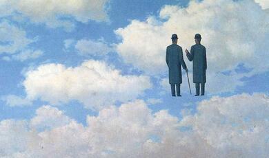 two men in old fashioned suits walking amongst clouds