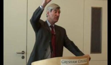 Vernon Bogdanor, right hand raised, at the podium
