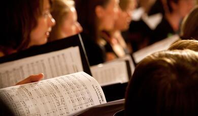 Choristers with open music books