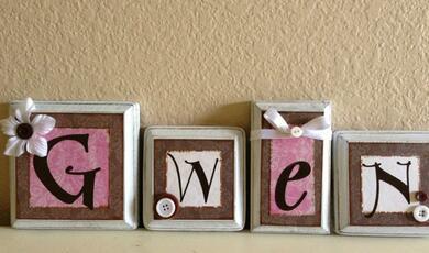 Letter blocks spelling 'Gwen'